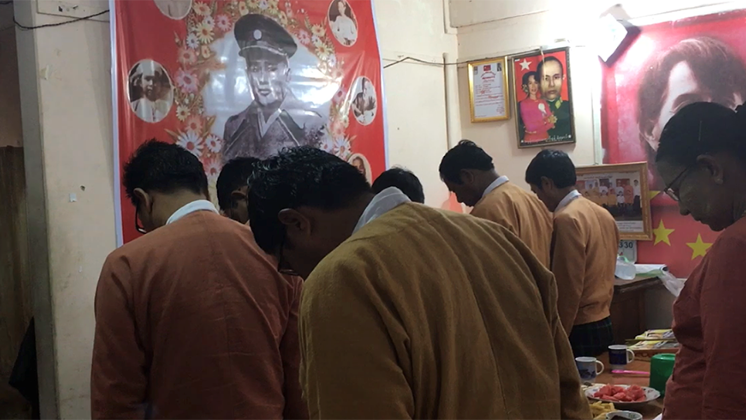 Former political prisoners, activists, and civilian supporters perform the traditional ‘aleipyu’ to honour fallen martyrs of the democracy movement at the NLD’s office in Thingangyun, Yangon.